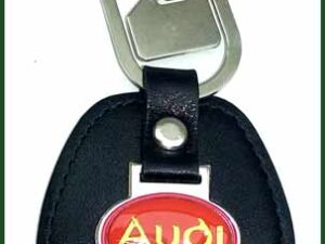 Přívěsek Audi - Kombinace kov, koženka, celková délka cca 10cm